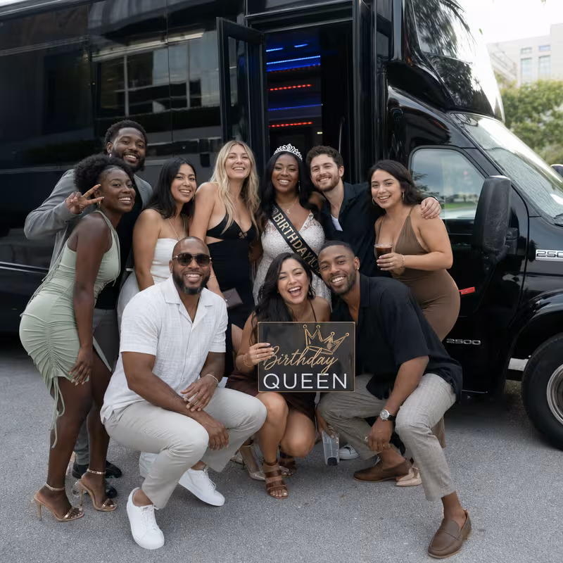 Party bus interior with wraparound leather seating and LED lighting in Fort Lee