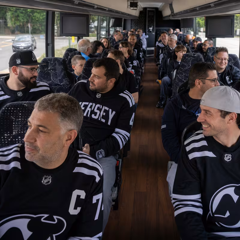 Passenger seating aboard a Fort Lee party bus rental