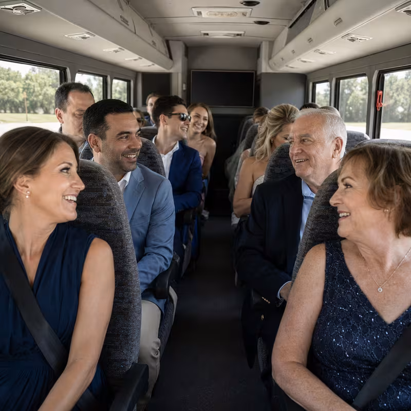 Group boarding a white charter bus for Private Event Transportation transportation in Fort Lee