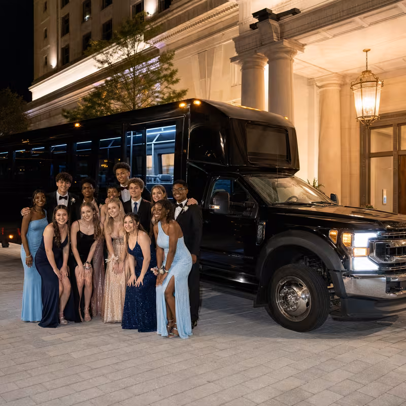 Party bus interior with wraparound leather seating and LED lighting in Fort Lee