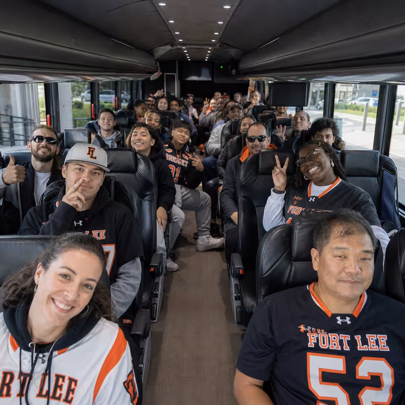 Black Mercedes Sprinter van staged for an Fort Lee Sporting Event Transportation group